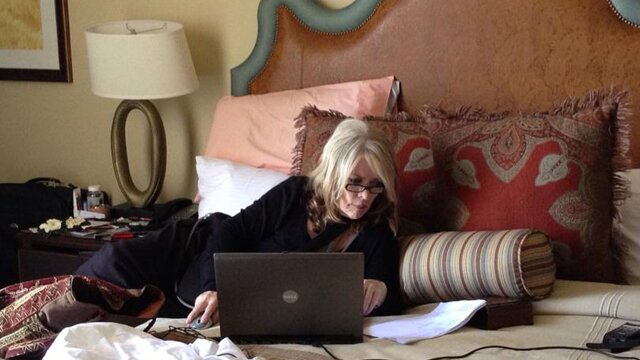 Margaret Moser working at the hotel on the Austin Music Awards. Photo by Cheryl Smith. 